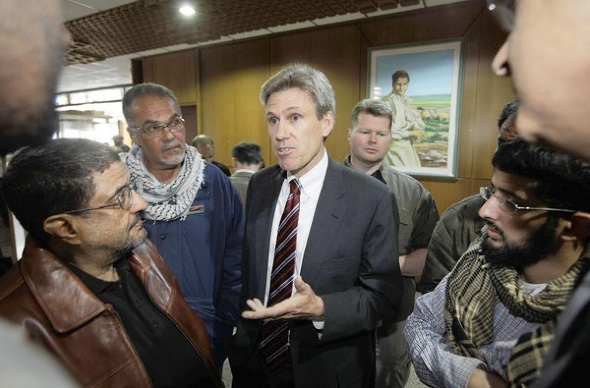 Then-U.S. envoy J. Christopher Stevens speaks to journalists in Benghazi, Libya, in April 2011. Stevens, who became ambassador to Libya this year, was killed during the protests at the U.S. Consulate in Benghazi.