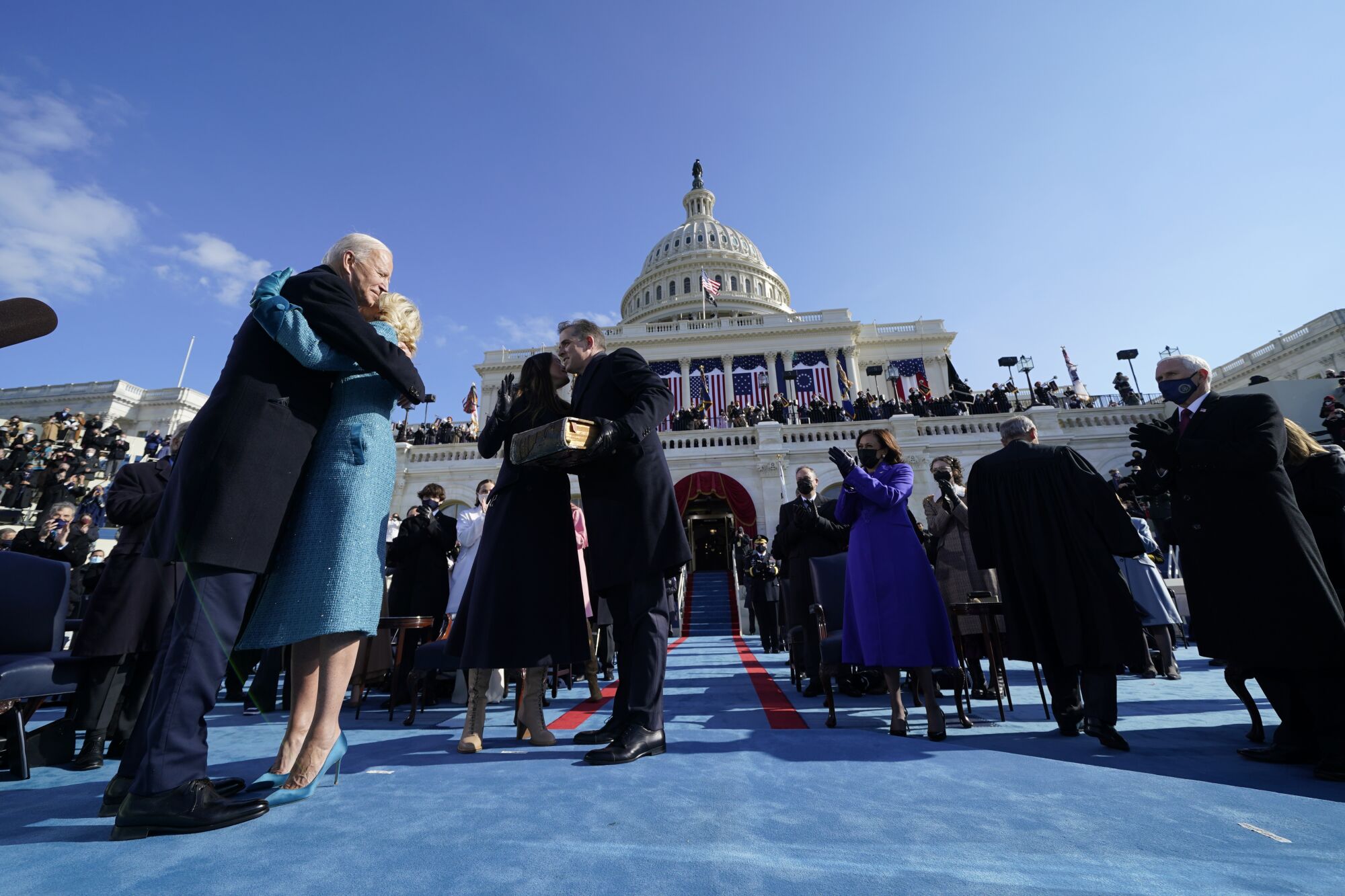 Joe Biden hugs First Lady Jill Biden after he was sworn in as the 46th president of the United States.