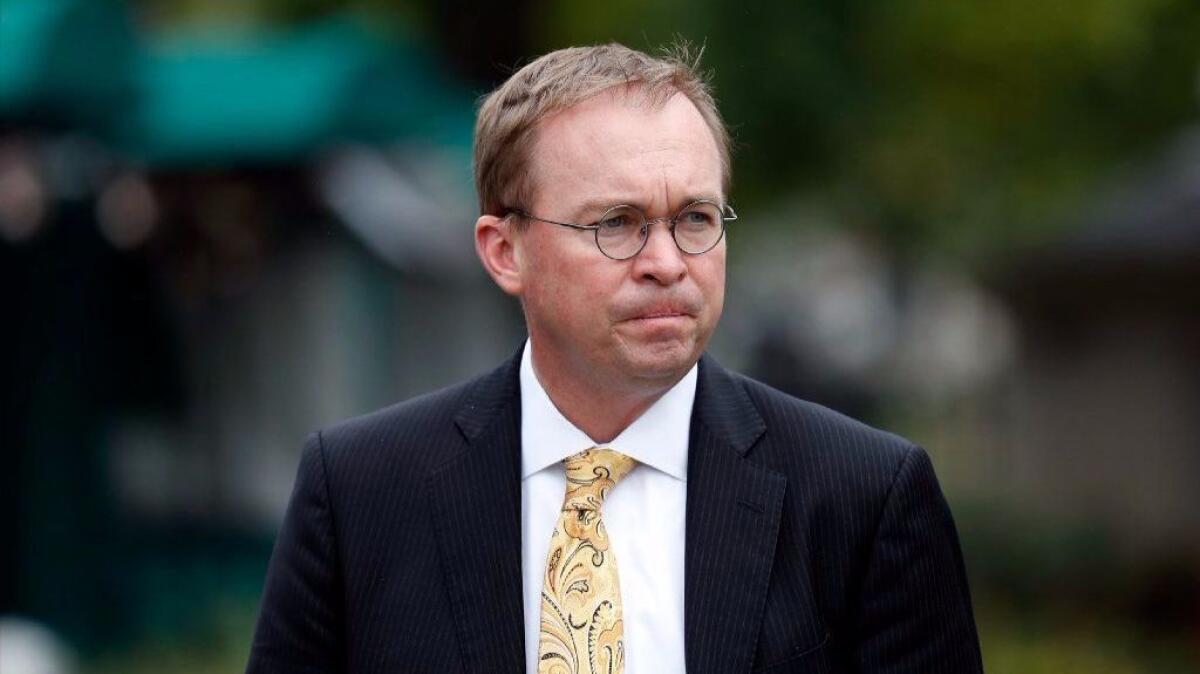 Director of the Office of Management and Budget Mick Mulvaney departs after a television interview at the White House in Washington on Sept. 13, 2017.