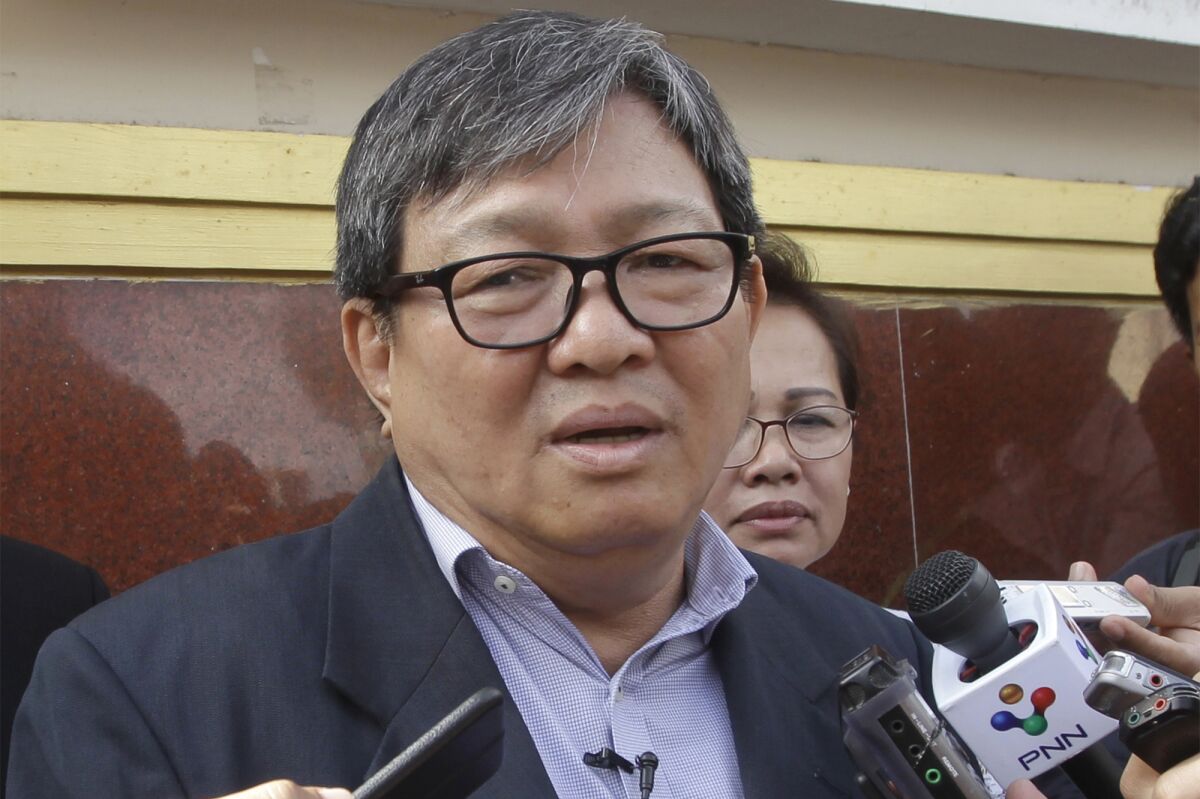 FILE - Cambodian politician Son Chhay, speaking to the media in Phnom Penh, Cambodia on Nov. 7, 2016. Cambodia's ruling Cambodian People's Party on June 14, 2022, filed a lawsuit against Son Chhay, vice president of the opposition Candlelight Party, demanding $1 million in compensation for his comments in an interview calling the June 5 nationwide commune elections unfair. (AP Photo/Heng Sinith, File)
