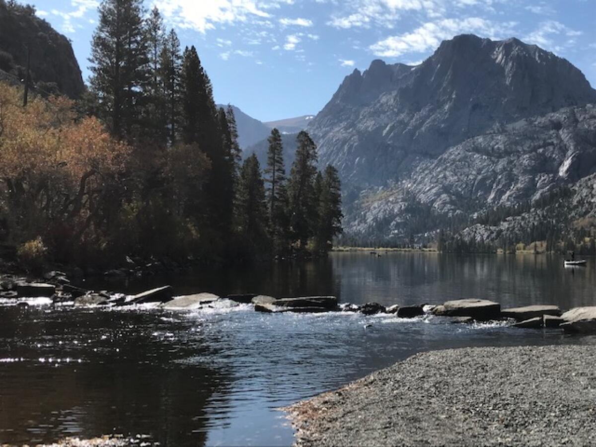 A dark little stream spills out of Silver Lake, one of the great escapes in the Sierra.