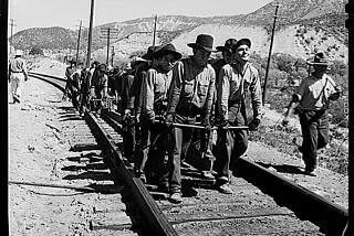 An Indian "section gang" forced to work on the Atchison, Topeka, and Santa Fe Railroad track in El Cajon, California, 1943. photo by Jack Delano, Library of Congress