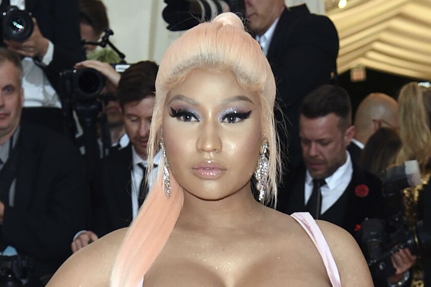 FILE - Nicki Minaj attends The Metropolitan Museum of Art's Costume Institute benefit gala in New York, in this Monday, May 6, 2019, file photo. The 64-year-old father of rapper Nicki Minaj has died after being struck by a hit-and-run driver in New York, police said. Robert Maraj was walking along a road in Mineola on Long Island at 6:15 p.m. Friday when he was hit by a car that kept going, Nassau County police said. Maraj was taken to a hospital, where he was pronounced dead Saturday, Feb. 13, 2021. (Photo by Evan Agostini/Invision/AP, File)