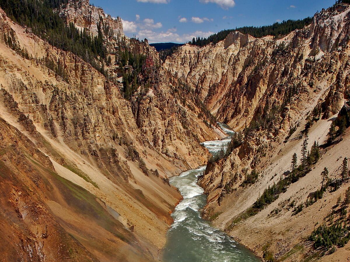 The Yellowstone River flows through Yellowstone National Park's Grand Canyon, where officials say an 8-year-old Poway girl fell to her death.