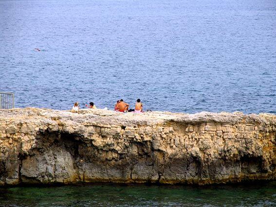 Sunbathing on a spit off Ortygia Island.