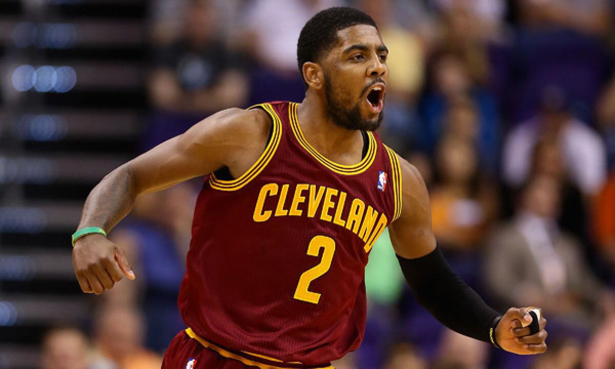 Cleveland's Kyrie Irving celebrates after scoring a basket during Wednesday's win over the Phoenix Suns.