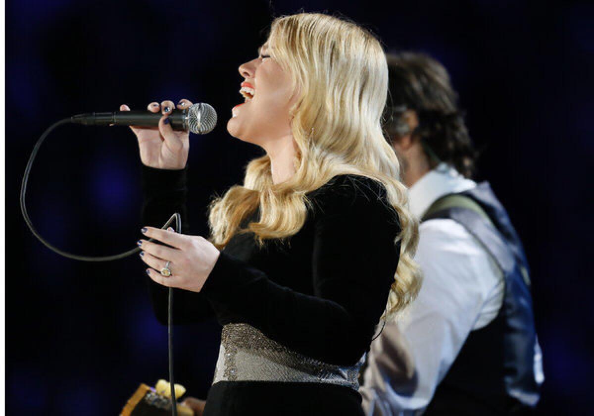 Singer Kelly Clarkson, performing at the 2013 Grammy Awards, may not get to take possession of the Jane Austen ring she bought at auction last year.