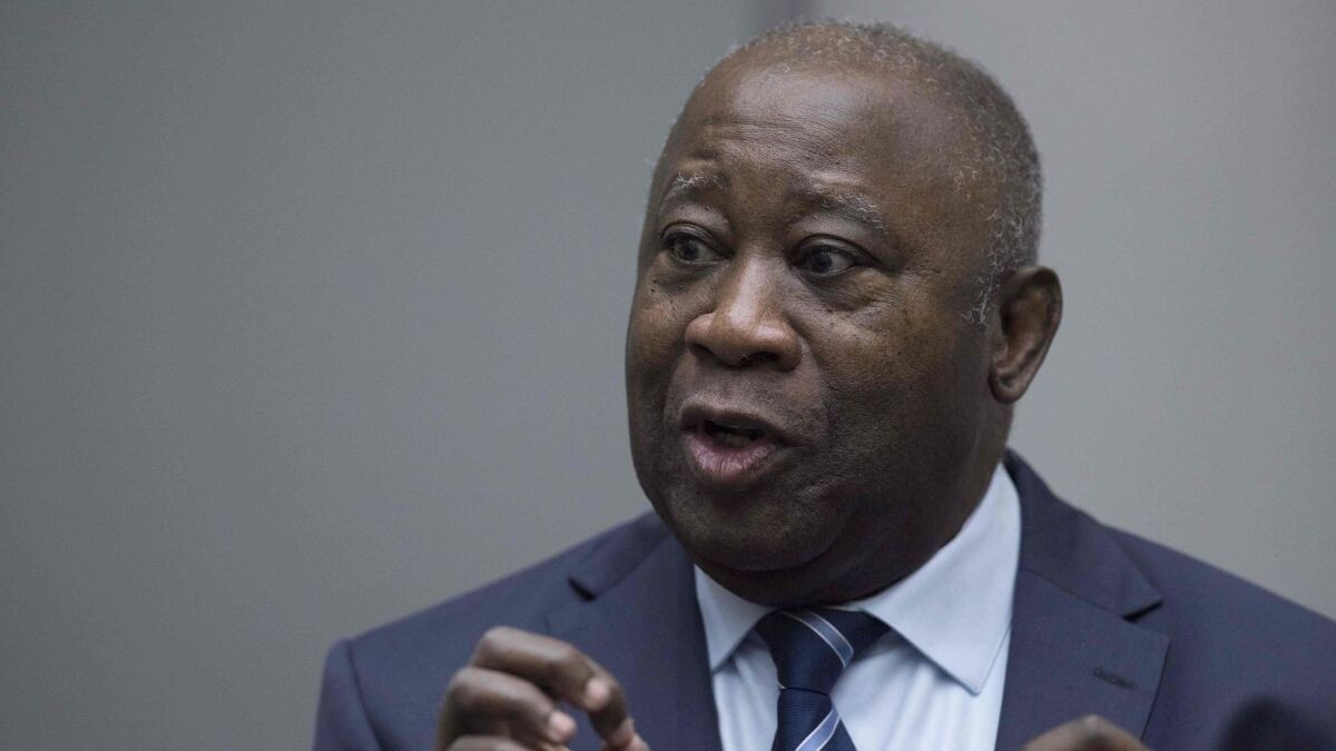 Laurent Gbagbo, former Ivory Coast president, enters International Criminal Court in the Hague. He was the first former president to go on trial at the global court.