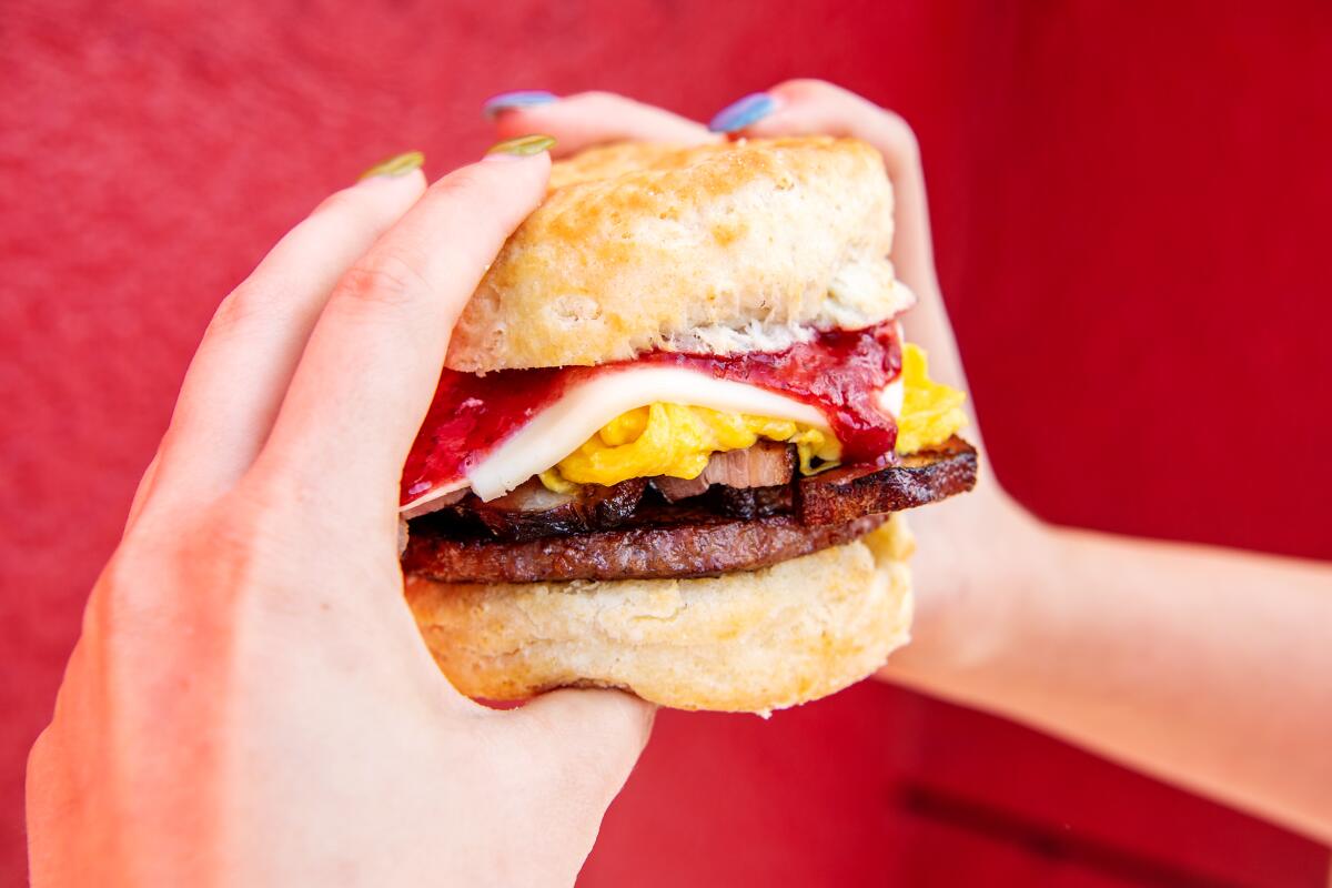 All Day Baby's terrific ADB Biscuit Sandwich includes egg, cheese, sausage or bacon (or both) and strawberry jam.