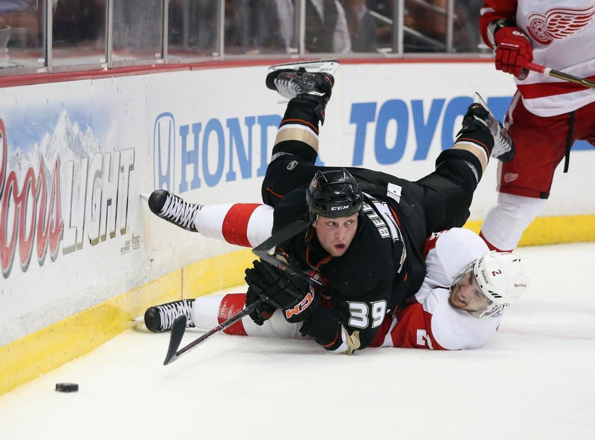 Ducks forward Matt Beleskey falls over Detroit Red Wings defenseman Brendan Smith during Game 5 of the Western Conference quarterfinals in May. Beleskey will be returning to the Ducks for the 2013-14 season.