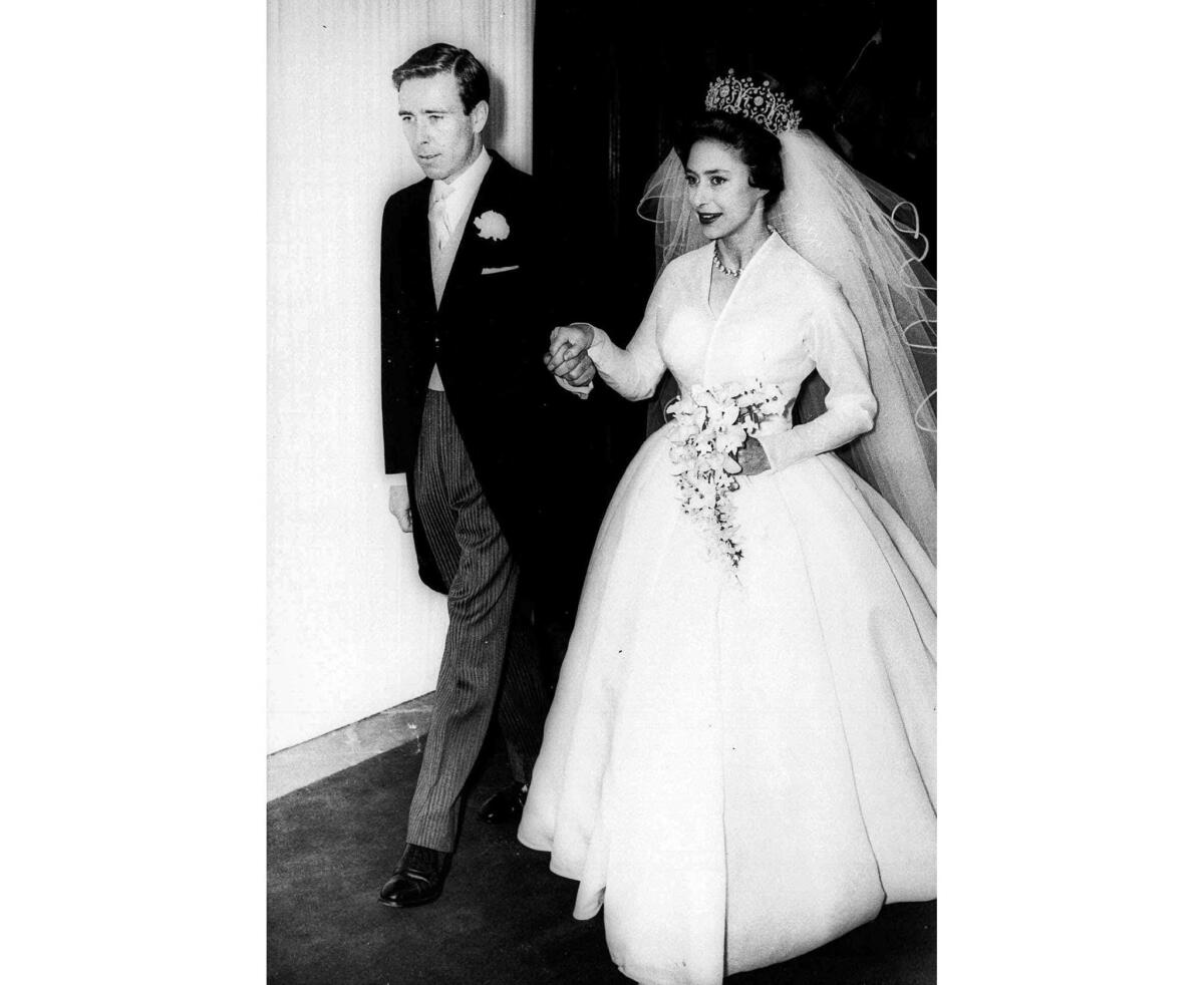 May 6, 1960: Antony Armstrong-Jones and his bride, Princess Margaret, leave London's Westminster Abbey after their wedding.