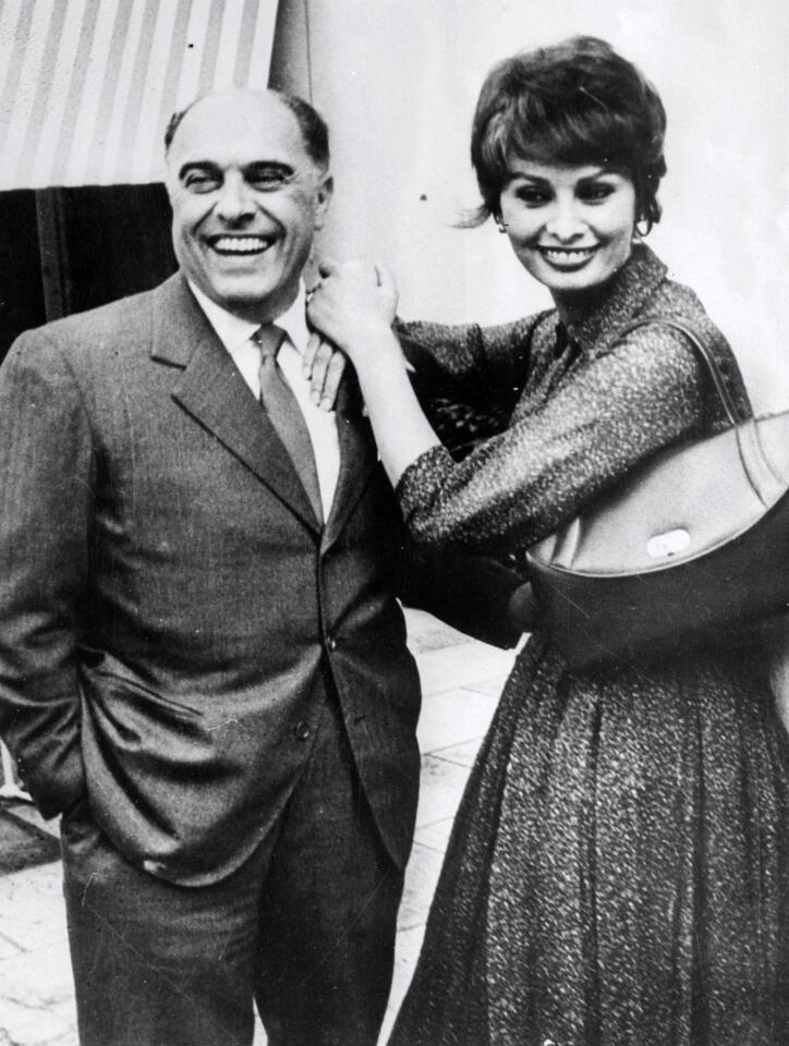 Sophia Loren and her husband, Carlo Ponti, in Paris in 1959. Sophia caught the filmmaker's eye when, at age 14, she placed in a beauty contest. Ponti, 22 years her senior, guided her to take acting classes and helped launch her career. They remained together until Ponti's death in 2007.