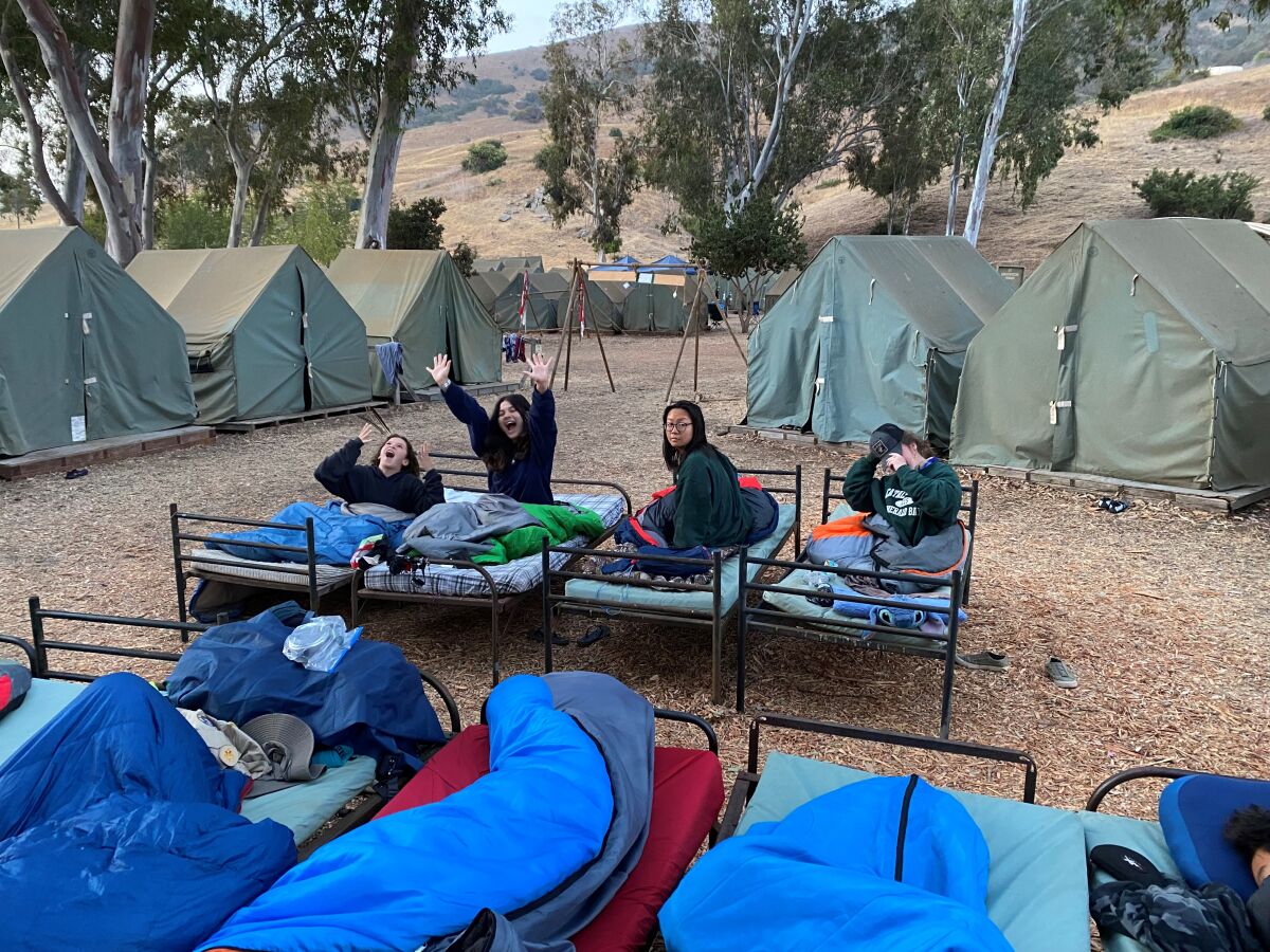 Quin Peters, Trinity Ludena, Monica Mak, and Peyton McKenzie camping at Emerald Bay.