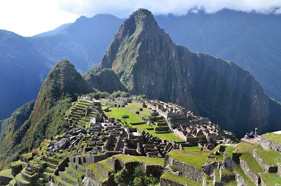 In the classic view of the Machu Picchu ruins, the peak of neighboring Wayna Picchu stands tall in the background. Photo taken in 2011.