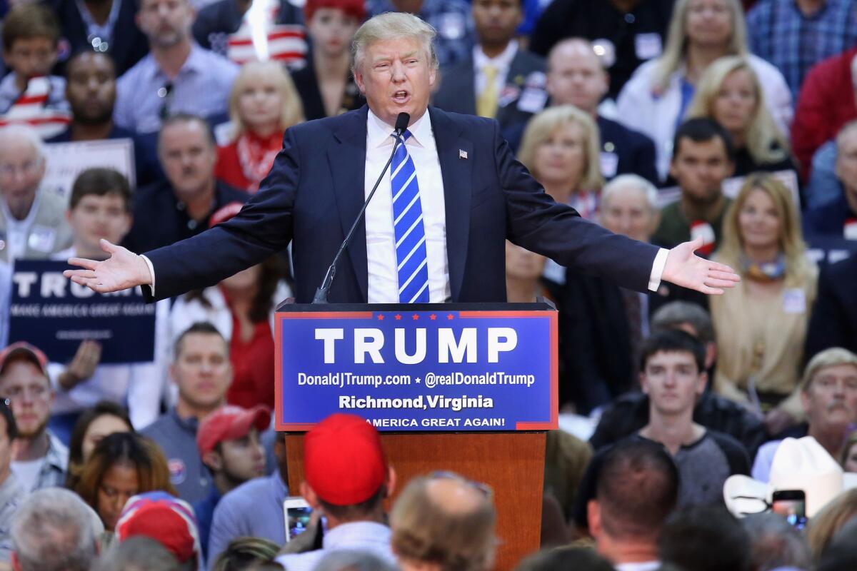 RICHMOND, VA - OCTOBER 14: Republican presidential candidate and front-runner Donald Trump addresses a crowd of more than seven thousand people during a campaign rally at the Richmond International Raceway October 14, 2015 in Richmond, Virginia. A New York real estate mogul and reality television star, Trump is now in a statistical tie with retired neurosurgeon Ben Carson in a Fox News survey of likely Republican voters released Tuesday. (Photo by Chip Somodevilla/Getty Images) *** BESTPIX *** ** OUTS - ELSENT, FPG, CM - OUTS * NM, PH, VA if sourced by CT, LA or MoD **