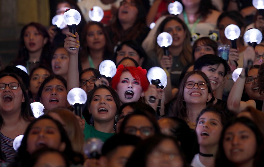 Fans cheer the Korean band BTS at Staples Center in Los Angeles in 2018.