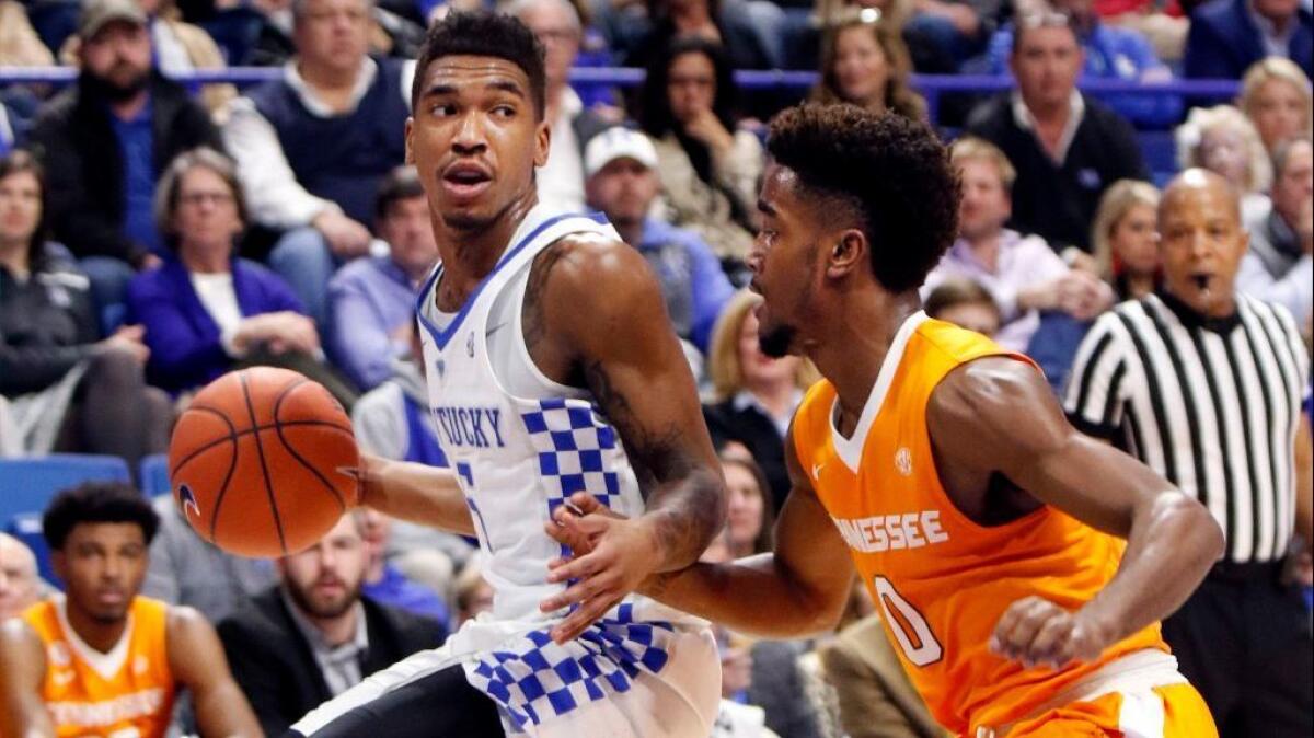 Kentucky guard Malik Monk, driving against Tennessee's Jordan Bone during an SEC game in February, scored 47 points against UNC during a December game in Las Vegas. (James Crisp / Associated Press)