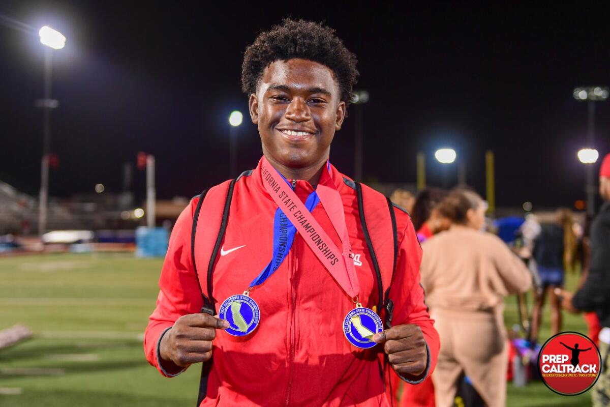 Rodrick Pleasant of Gardena Serra shows off his medals at Arcadia High during a summer track meet.