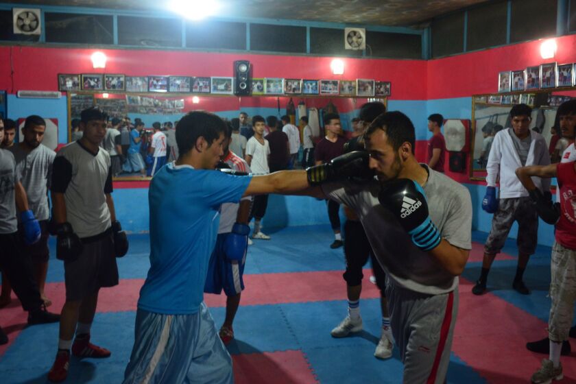 Boxers spar at a small gym in Kabul, Afghanistan.