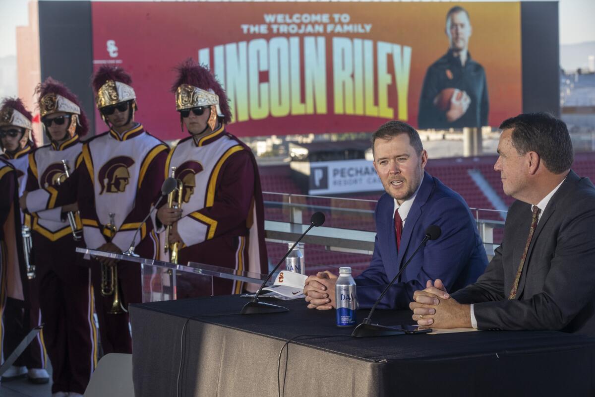 Lincoln Riley, the new USC head football coach, left, and USC athletic director Mike Bohn at a news conference. 
