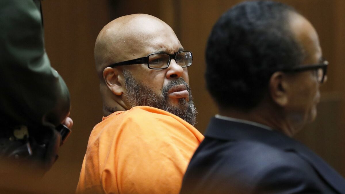 Former rap mogul Marion "Suge" Knight, left, with his defense attorney Albert DeBlanc Jr.,appears in Los Angeles Superior Court on Sept. 20, 2018.
