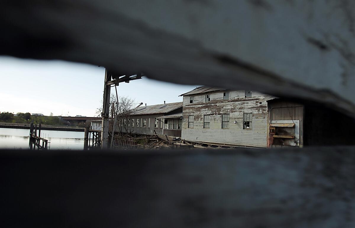 Shuttered maritime businesses dot the landscape around the Port of Stockton.