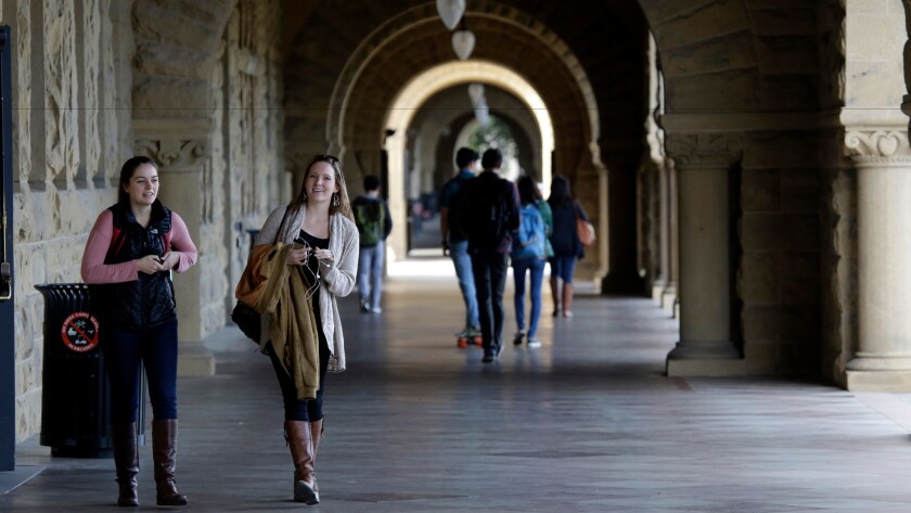 Students walk on campus at Stanford University in January.