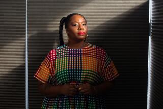 LOS ANGELES, CA - DECEMBER 06: Patrisse Cullors poses for a portrait at the Crenshaw Dairy Mart, an art gallery owned by Cullors in Inglewood on Monday, Dec. 6, 2021 in Los Angeles, CA. (Jason Armond / Los Angeles Times)