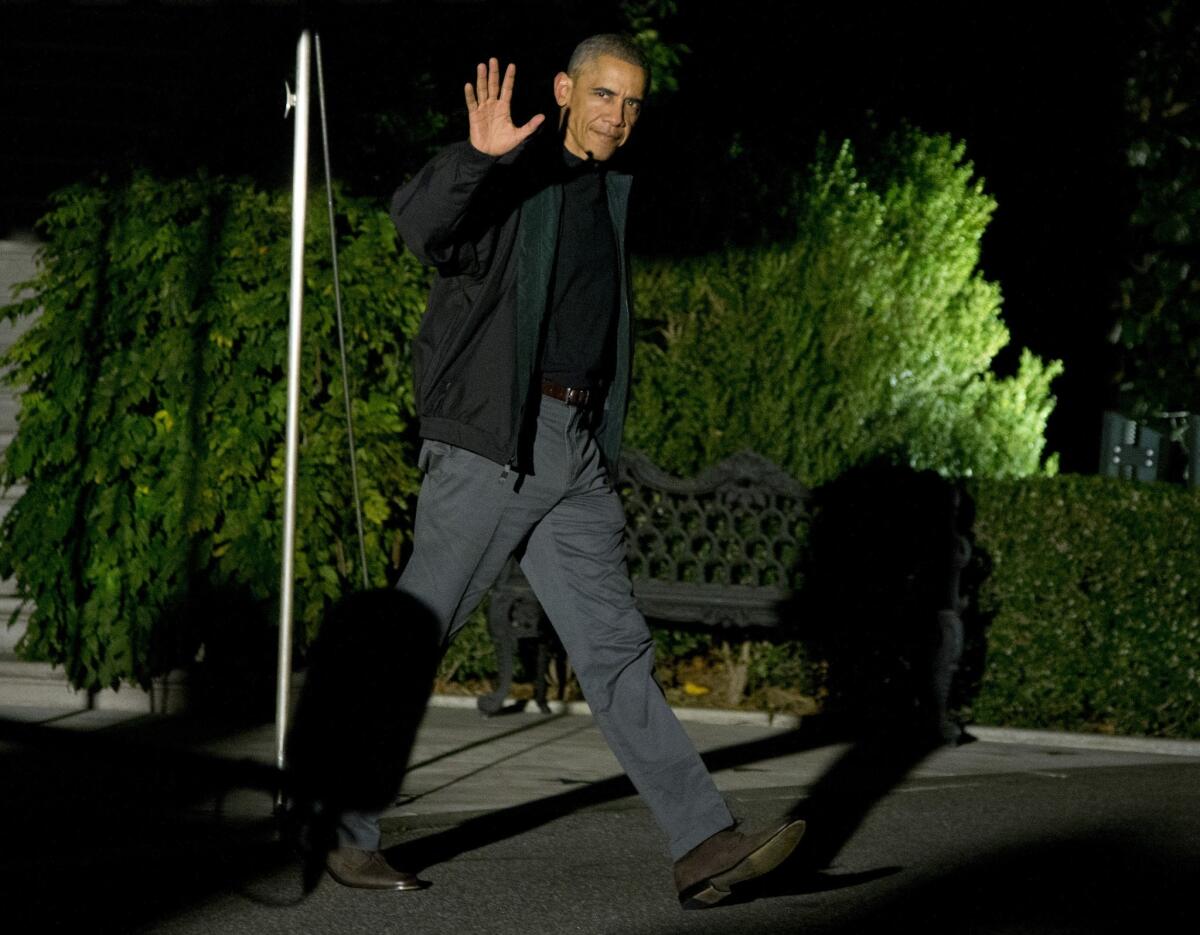 President Obama walks from the White House early Nov. 9 to begin his trip to Beijing, the start of a weeklong visit to Asia and Australia.