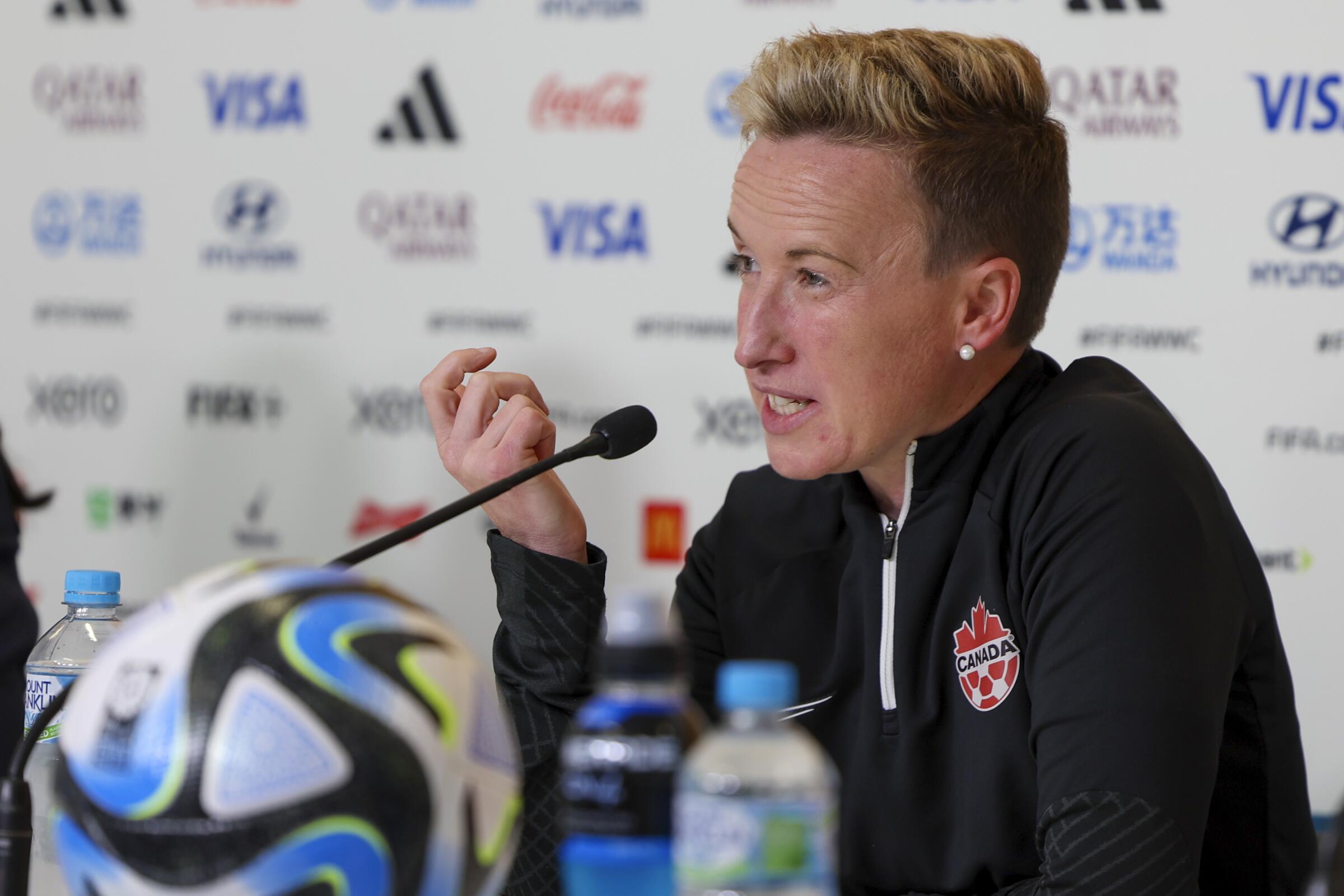 Canada women's soccer team coach Bev Priestman speaks during a news conference in July 2023. 