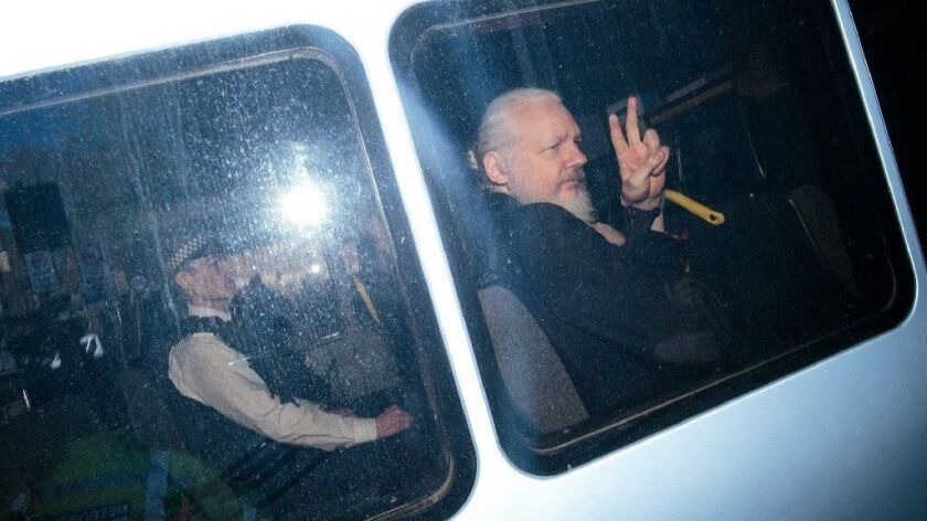 Julian Assange arrives at court in London in April.