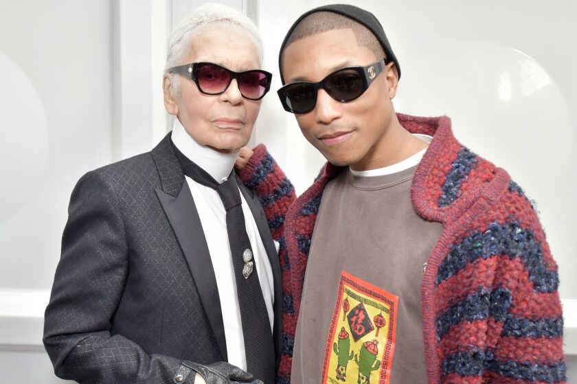 Karl Lagerfeld, left, and Pharrell Williams