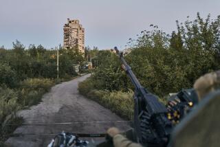 FILE - A Ukrainian soldier sits in his position in Avdiivka, Donetsk region, Ukraine, on Aug. 18, 2023. Ukrainian troops are under intense pressure from a determined Russian effort to storm the strategically important eastern Ukraine city of Avdiivka, officials say. Kyiv’s army is struggling with ammunition shortages as the Kremlin’s forces pursue a battlefield triumph around the two-year anniversary of Moscow’s full-scale invasion and ahead of a March presidential election in Russia. (AP Photo/Libkos, File)