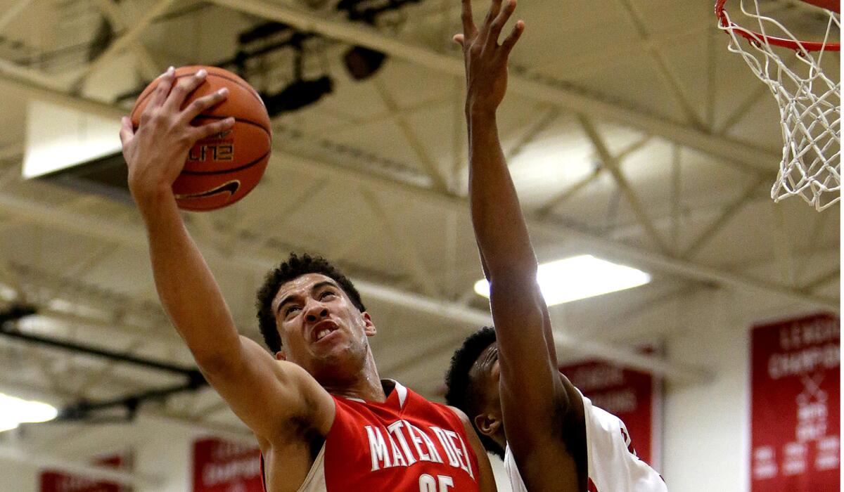 M.J. Cage, grabbing a rebound against Orange Luthern, is one of the Mater Dei players to watch in the Open Division state championship game on Saturday night.