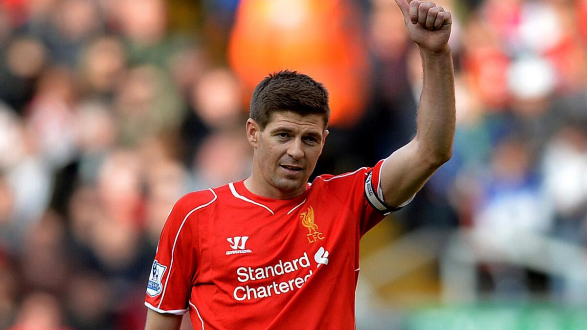 Steven Gerrard acknowledges the fans after an English Premier League game against Crystal Palace at Anfield stadium in Liverpool in April 2015.