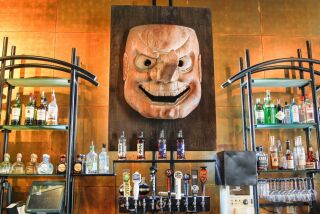 SAN DIEGO, CA June 13th 2018 | Large Tengu mask over the bar at Cafe Japengo on Wednesday in San Diego, California. After almost 30 years in the UTC area the popular Asian Fusion restaurant is closing its doors. | (Eduardo Contreras / San Diego Union-Tribune)