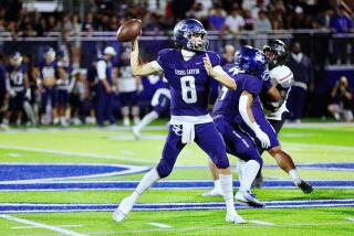 Sierra Canyon quarterback makes a pass from the pocket during a win over Oaks Christian on Friday night.