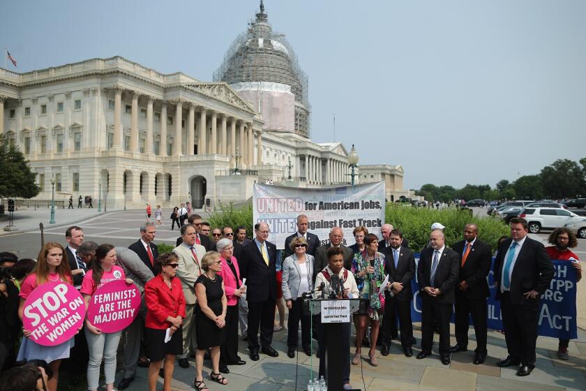Rep. Barbara Lee (D-Oakland) and fellow Democratic members of Congress hold a news conference with labor, envirnonmental and human rights leaders to voice their opposition to the Trans-Pacific Partnership trade deal at the U.S. Capitol on June 10.