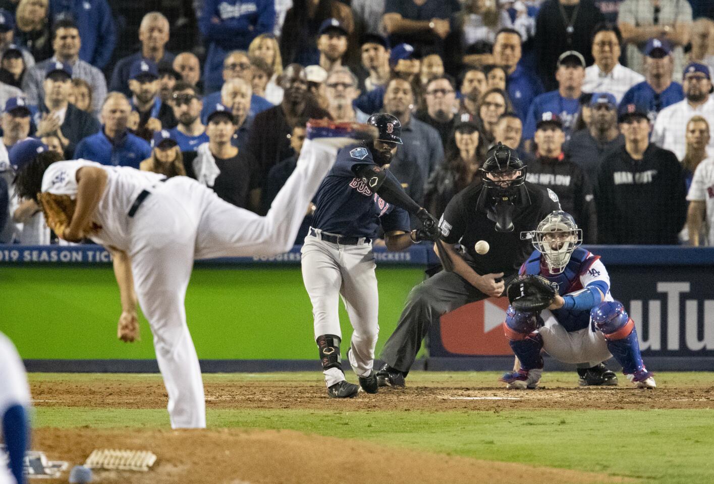 Red Sox center fielder Jackie Bradley Jr. hits a solo homer off Dodgers relief pitcher Kenley Jansen to tie the game in the eighth inning.