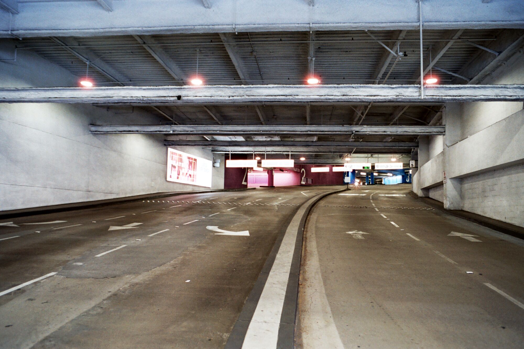 Entry and exit lanes in a large parking garage