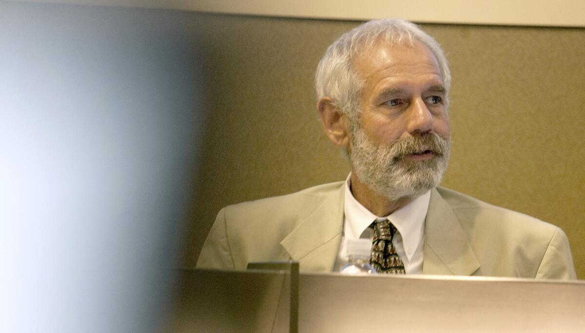 Public Utilities Commissioner Michael Picker, above in 2014, presided over a public hearing in Los Angeles on Tuesday to consider public comment on Charter Communications' proposed takeover of Time Warner Cable and Bright House Networks.