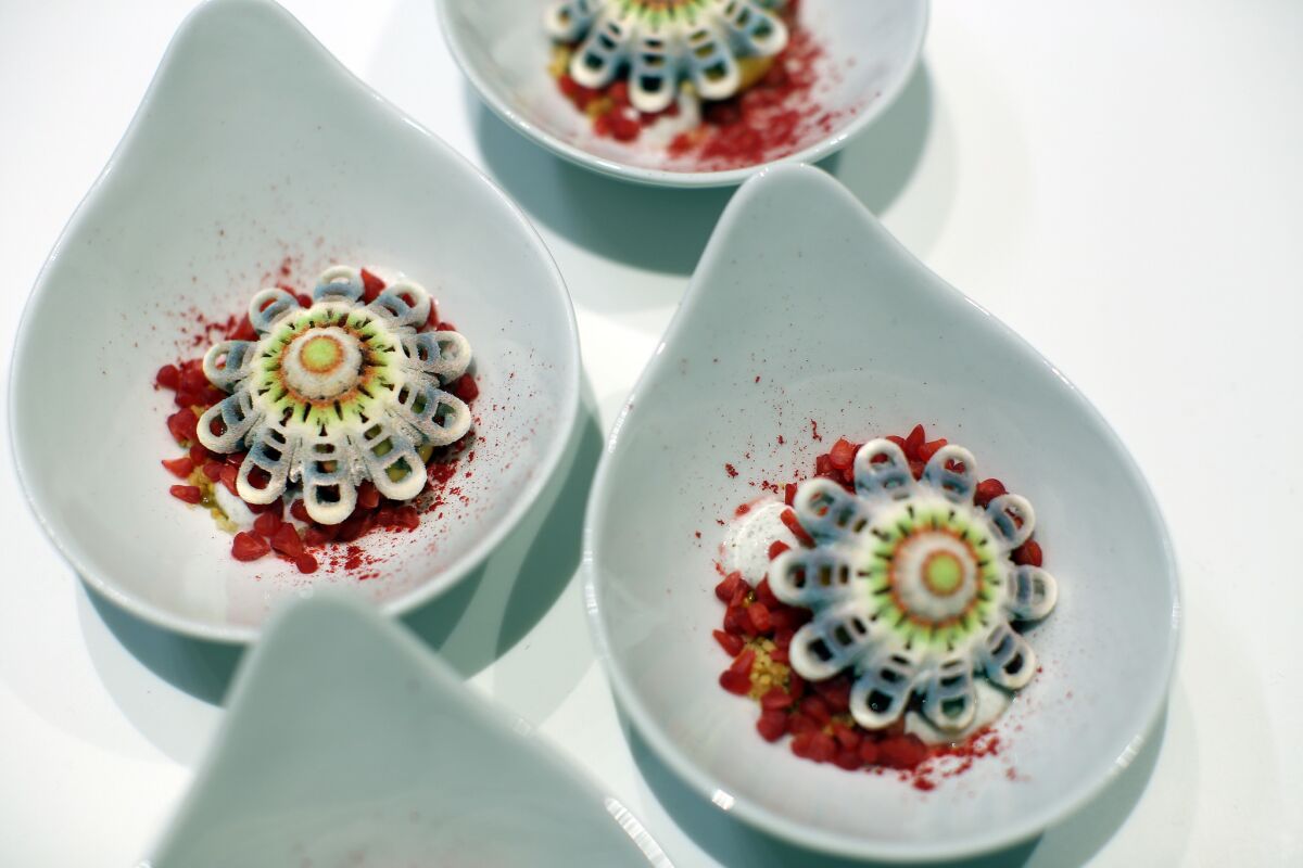 Chef Mei Lin used a 3D printed passionfruit flower to make this dessert. The 3DS Culinary Lab in Los Angeles held an opening with top chefs preparing food with the aid of a 3D printer known as a ChefJet Pro.