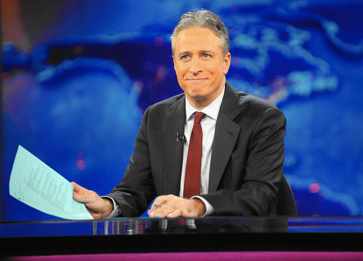 Jon Stewart, see here in 2011, announced Tuesday he will leave "The Daily Show" later in 2015.