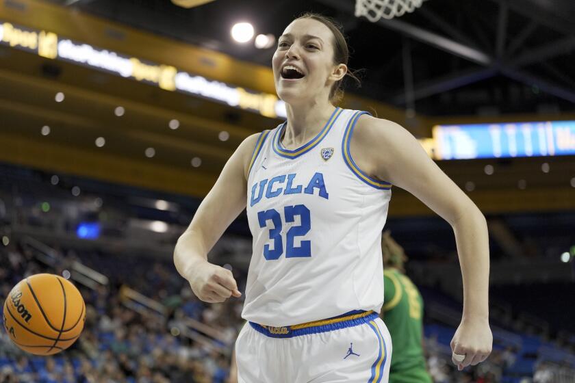 UCLA forward Angela Dugalic (32) reacts after drawing a foul call against Oregon.