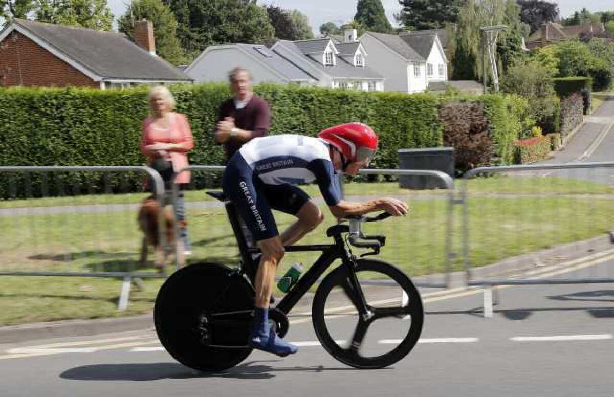 Bradley Wiggins cycles his way to a gold medal, becoming the most decorated Olympian in British history.