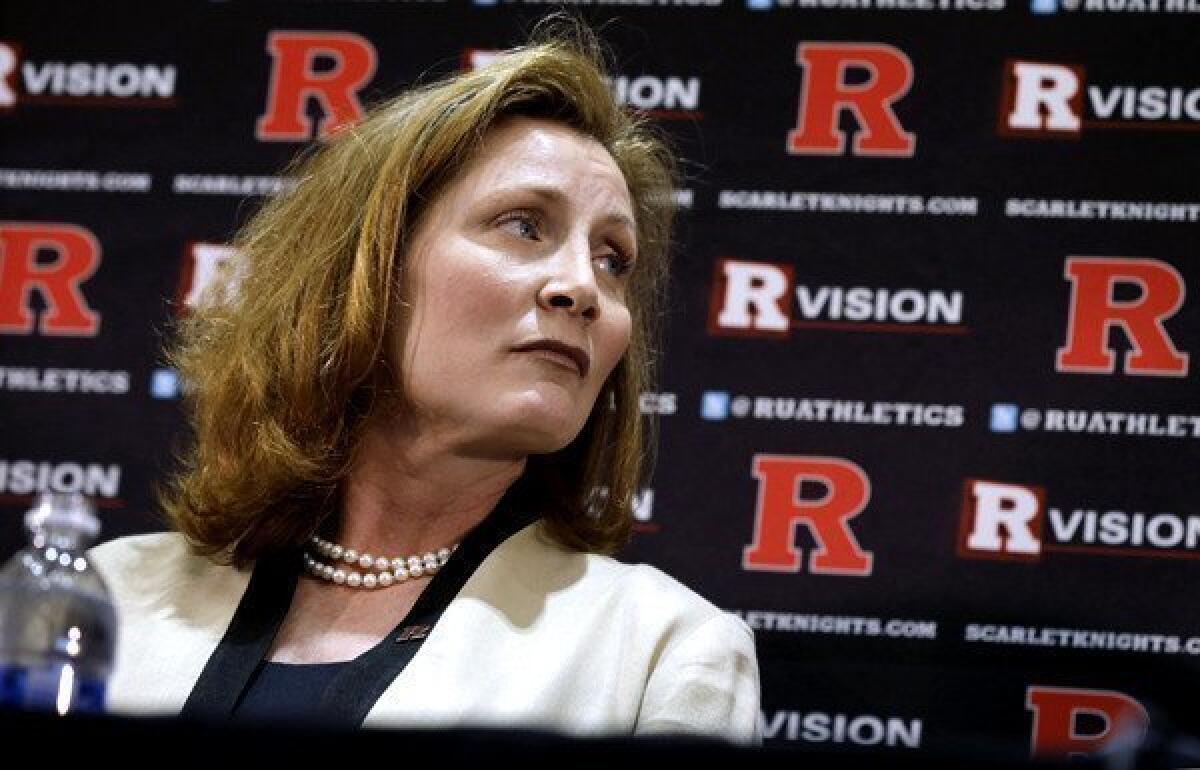 Julie Hermann listens as Rutgers President Robert Barchi announces her hiring as athletic director earlier this month.