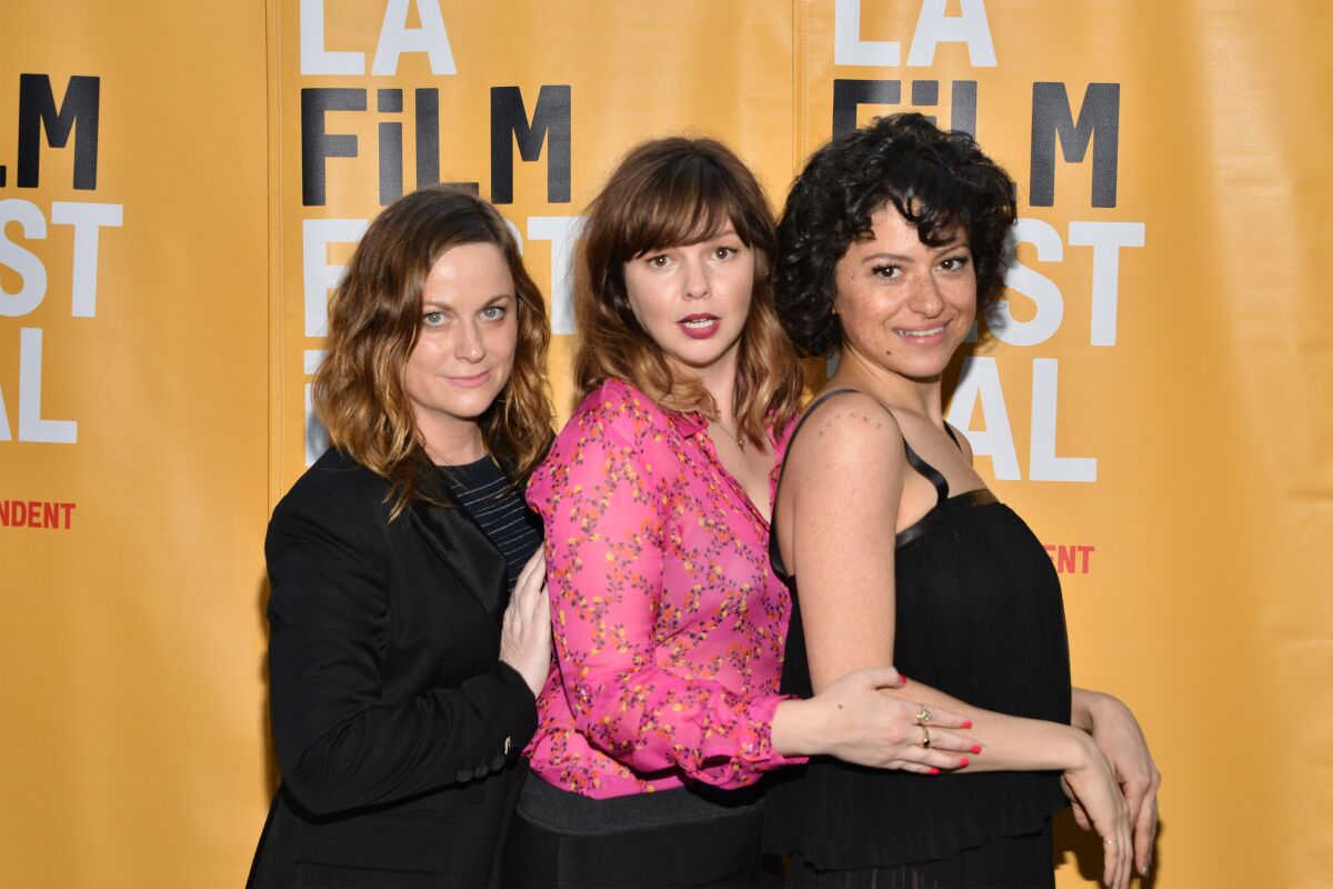 Amy Poehler, left, Amber Tamblyn and Alia Shawkat at the "Paint It Black" premiere Friday at the Los Angeles Film Festival.