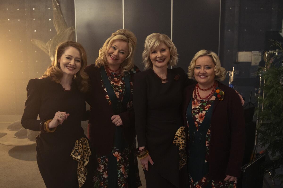 Miranda Otto, Caroline Rhea, Beth Broderick and Lucy Davis posing for a photo in matching costumes