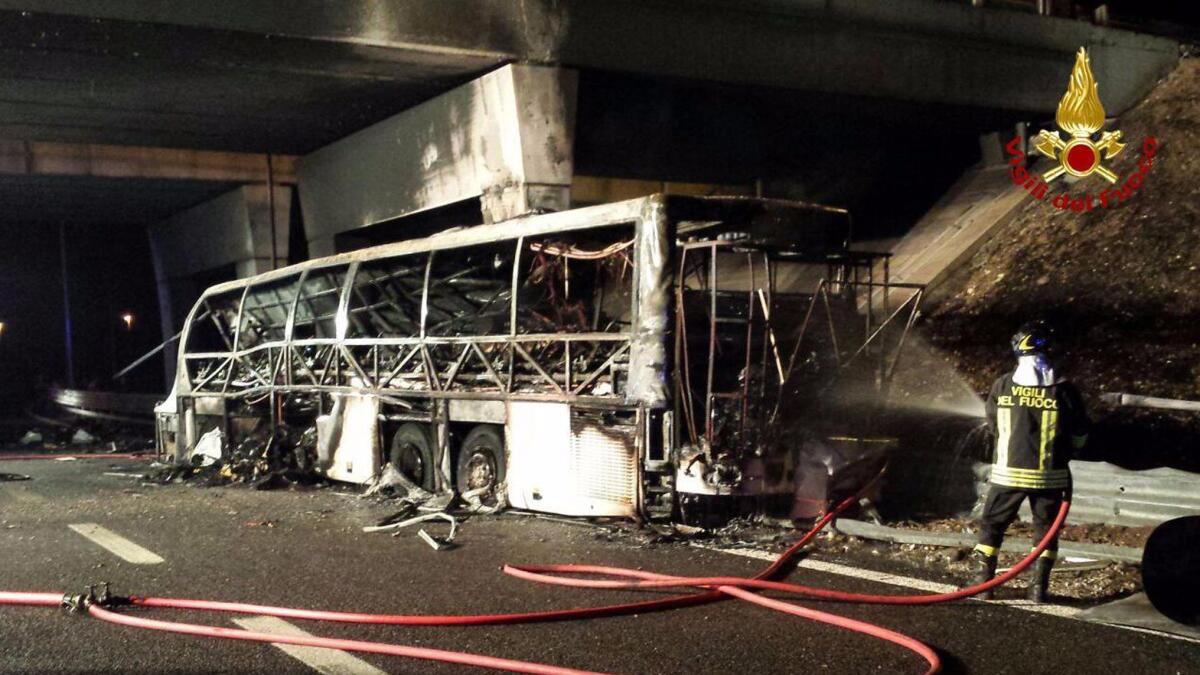 A burned Hungarian bus after an accident near Verona, Italy.