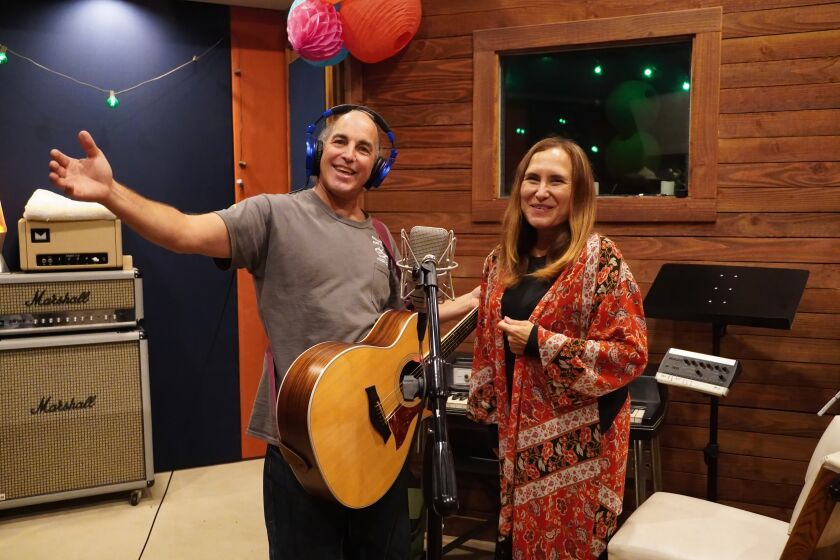 Acoustic duo Blossom & Bloom — Jeff Bloom and Sandra Herrera — will perform at The Athenaeum Music & Arts Library 